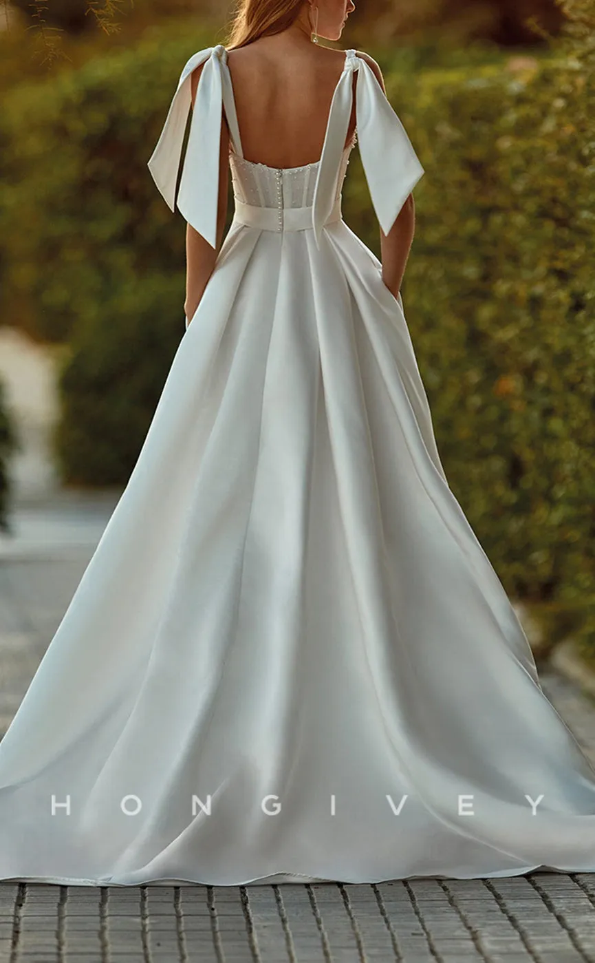 H0911 - Pearl Beaded With Train And Bow Detail Long Wedding Dress